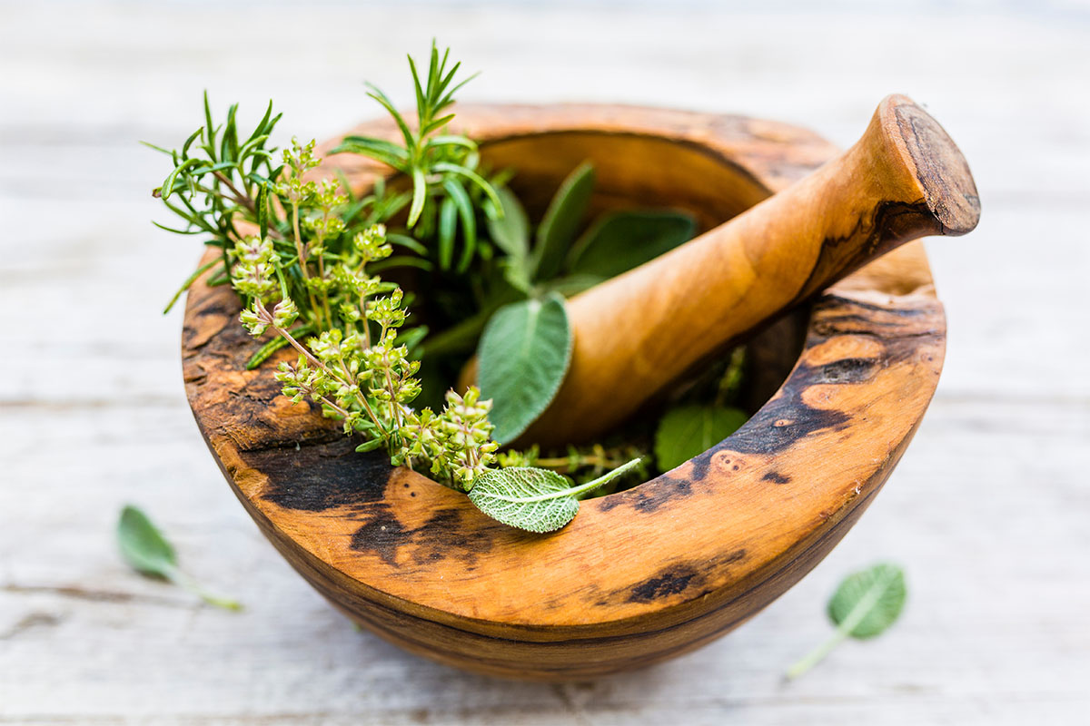 herbs in a wooden bowl